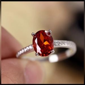 .925 sterling silver, orange tourmaline with zirconia’s